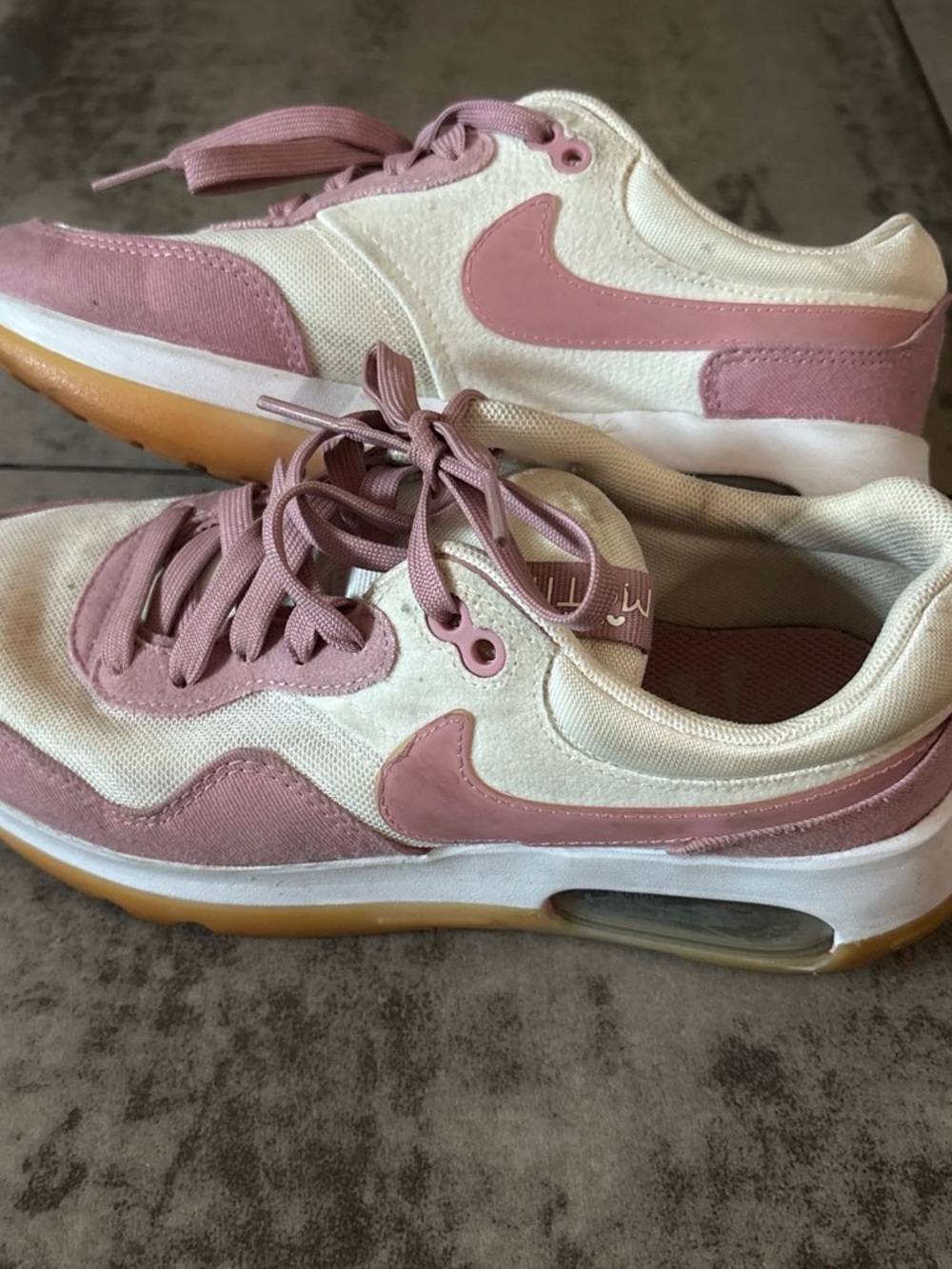 Nike Women’s Pink and White Air Cushion Sneakers